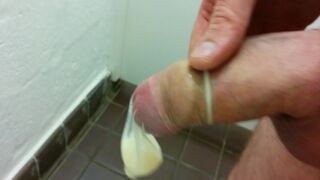 Filling A Condom With Cum In Public Toilet
